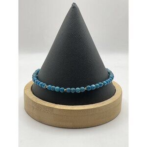 Blue Beaded Adjustable Bracelet With Gold Chain Accents